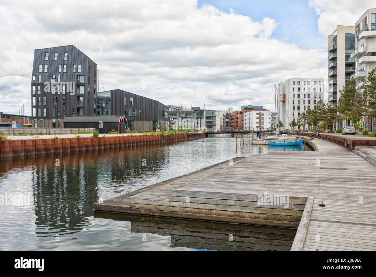 Zona residencial y marina en el puerto de Odense, Dinamarca Foto de stock