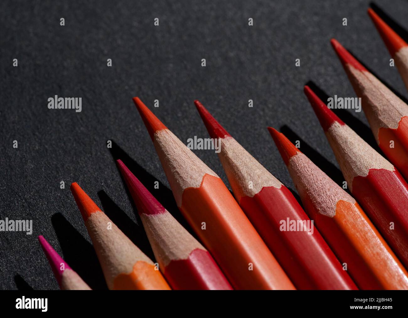 Los colores del lápiz en los colores de las zonas calientes Foto de stock