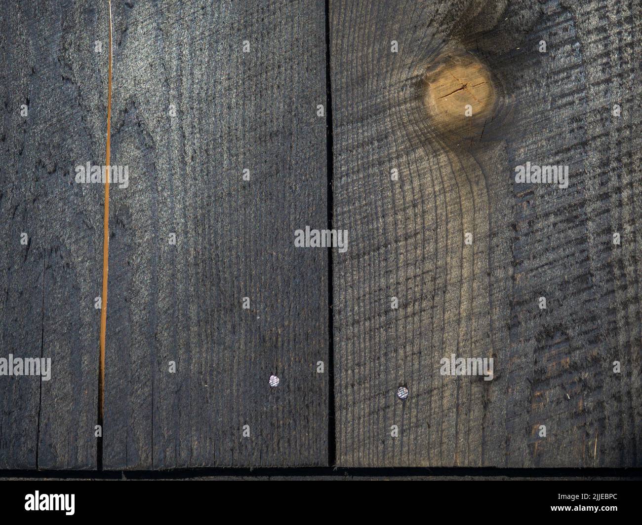 Fondo de tablas quemadas. Textura de madera quemada. Pared de madera