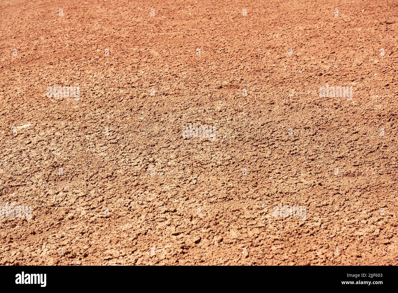 Textura de fondo del suelo anaranjado seco. Fondos abstractos de naturaleza Foto de stock