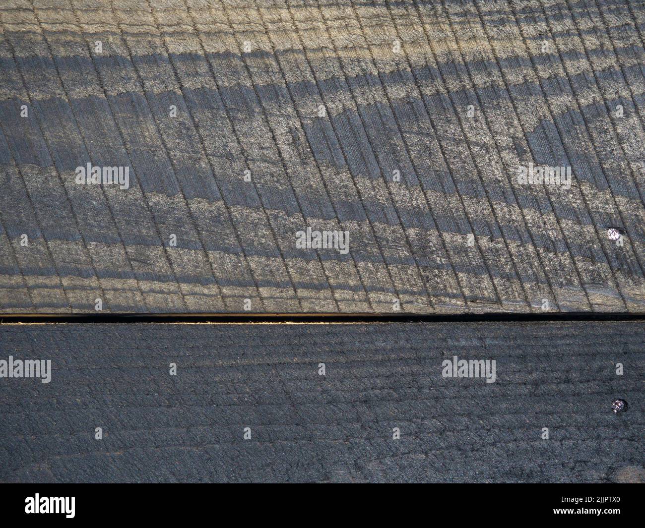 Fondo de tablas quemadas. Textura de madera quemada. Pared de madera