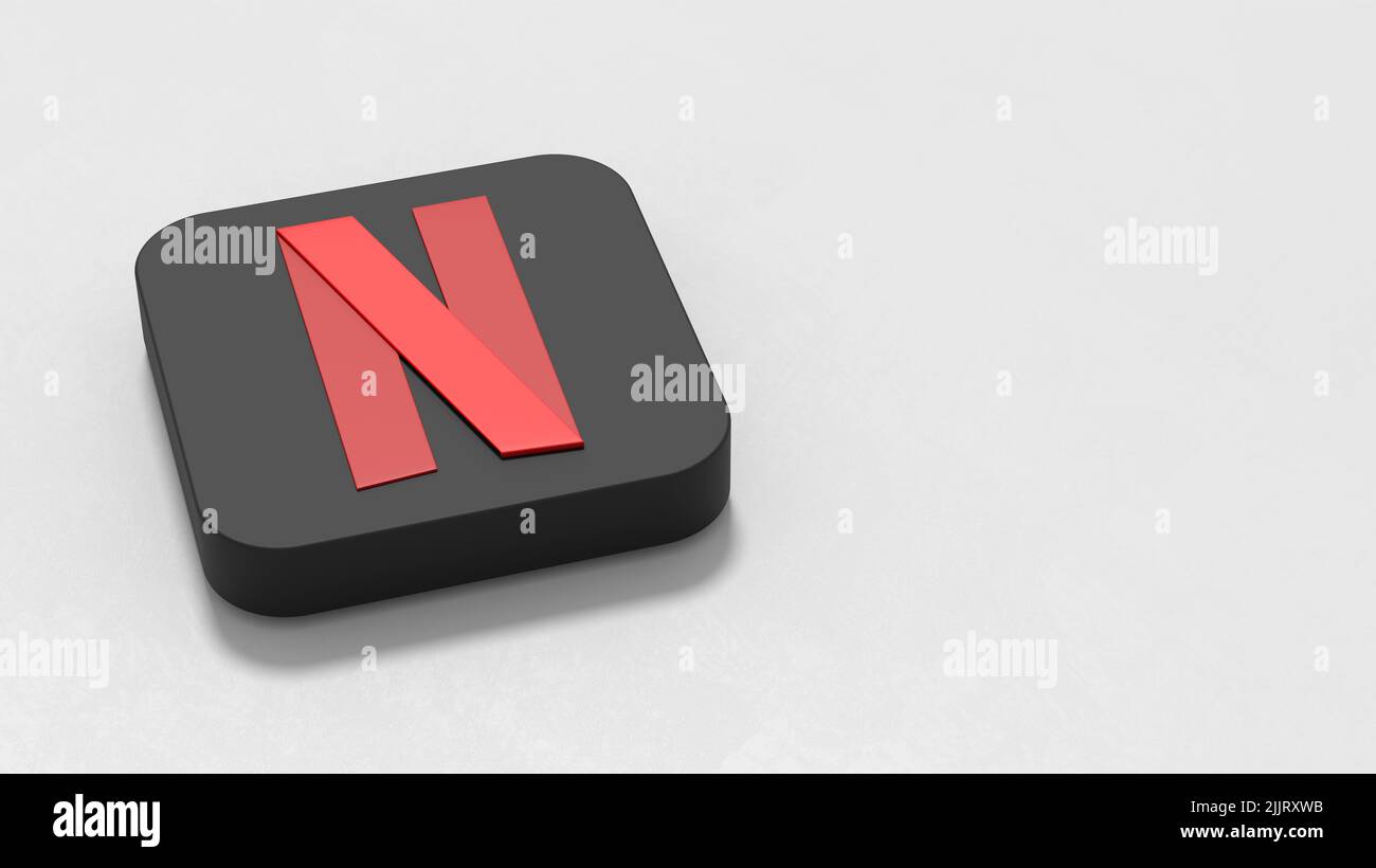 Logotipo de Netflix sobre fondo gris claro con espacio de copia Foto de stock