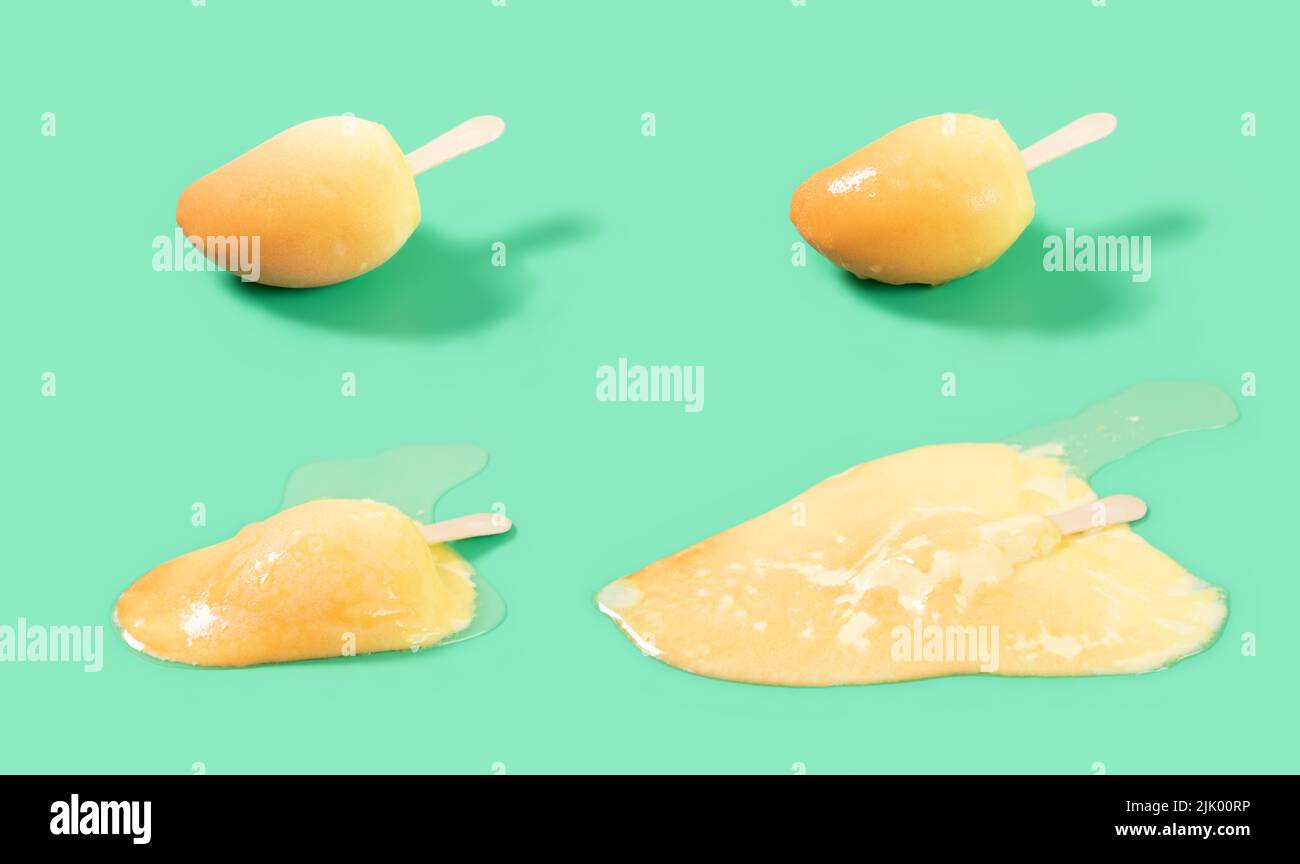 forma de mango de belleza y aroma de paleta de mango proceso de fusión en verde en ángulo lateral vista Foto de stock