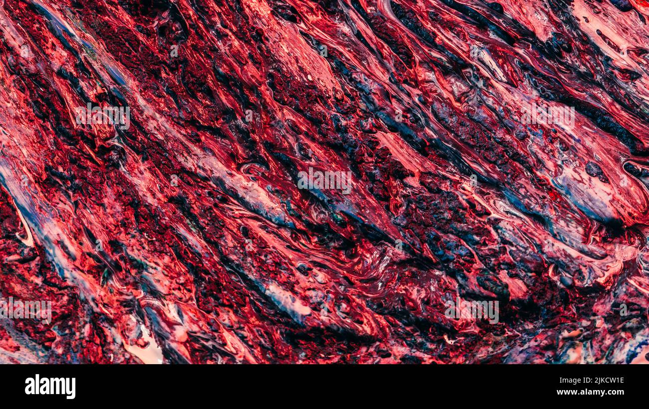 arte abstracto rojo marrón pintura húmeda magma fundido Foto de stock