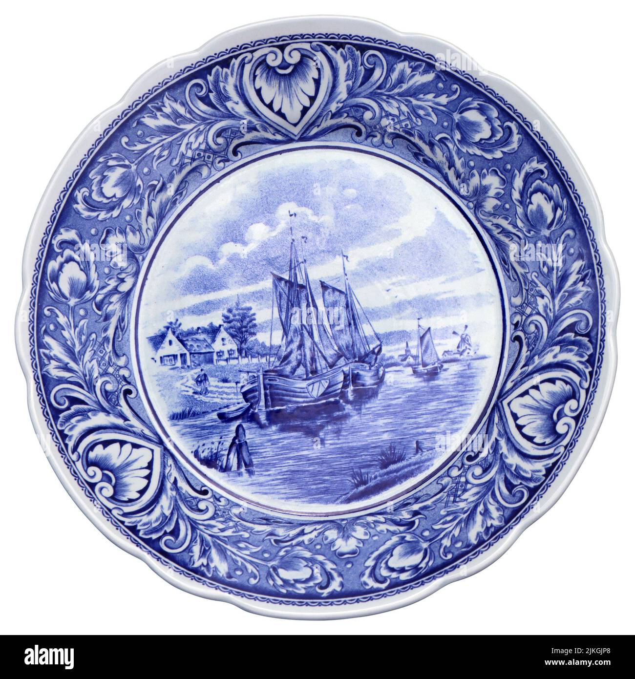 Plato de cerámica azul y blanca con motivos holandeses como recuerdo Foto de stock