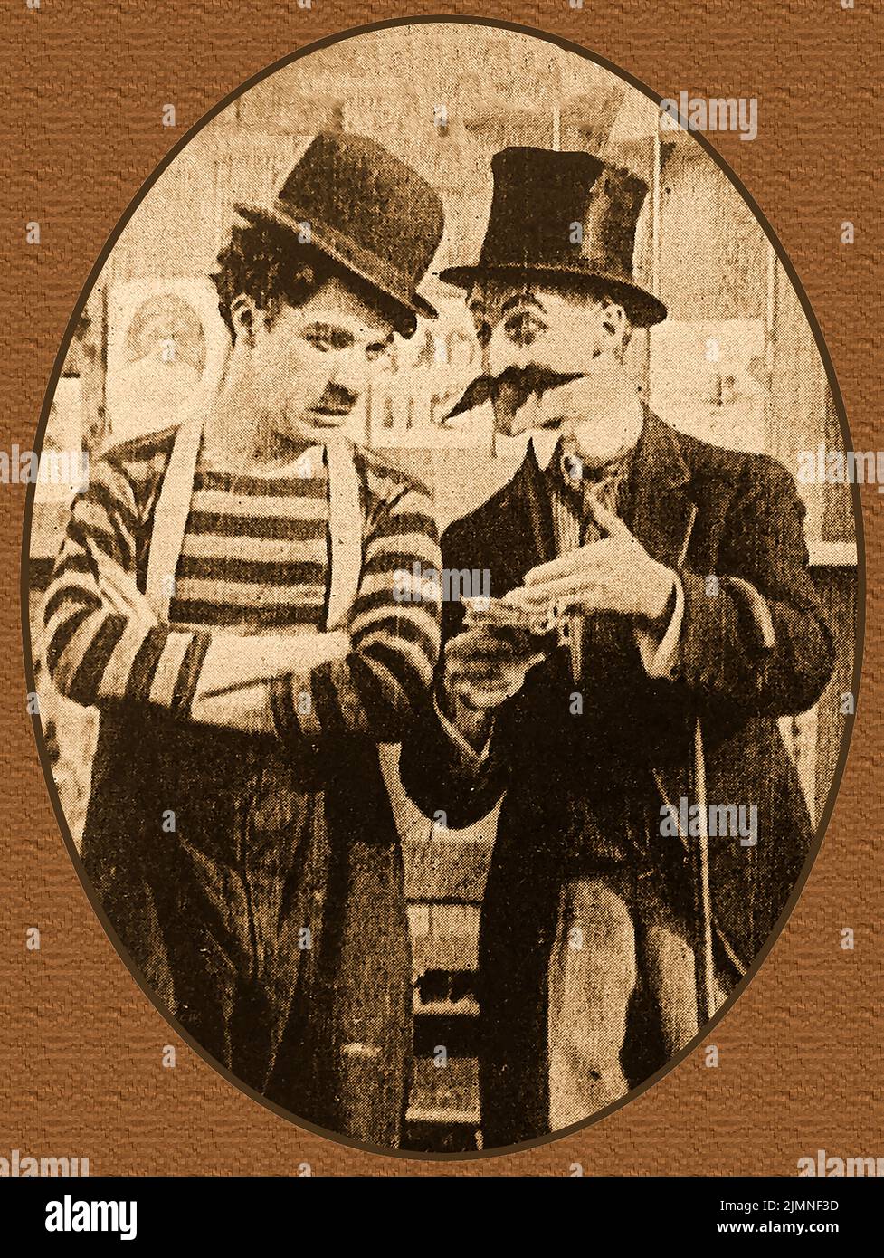 Una escena de Charlie Chaplin en la película de 1913 'El Campeón Foto de stock