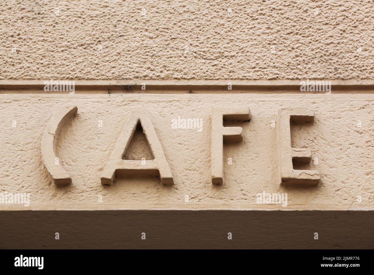 Señal de café en una pared Foto de stock
