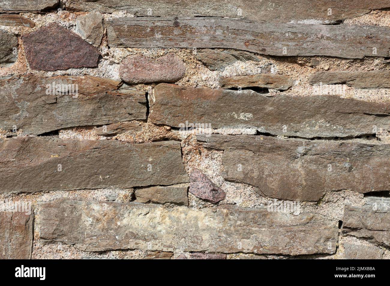 Viejo fondo de marco completo de la pared de piedra. Foto de stock