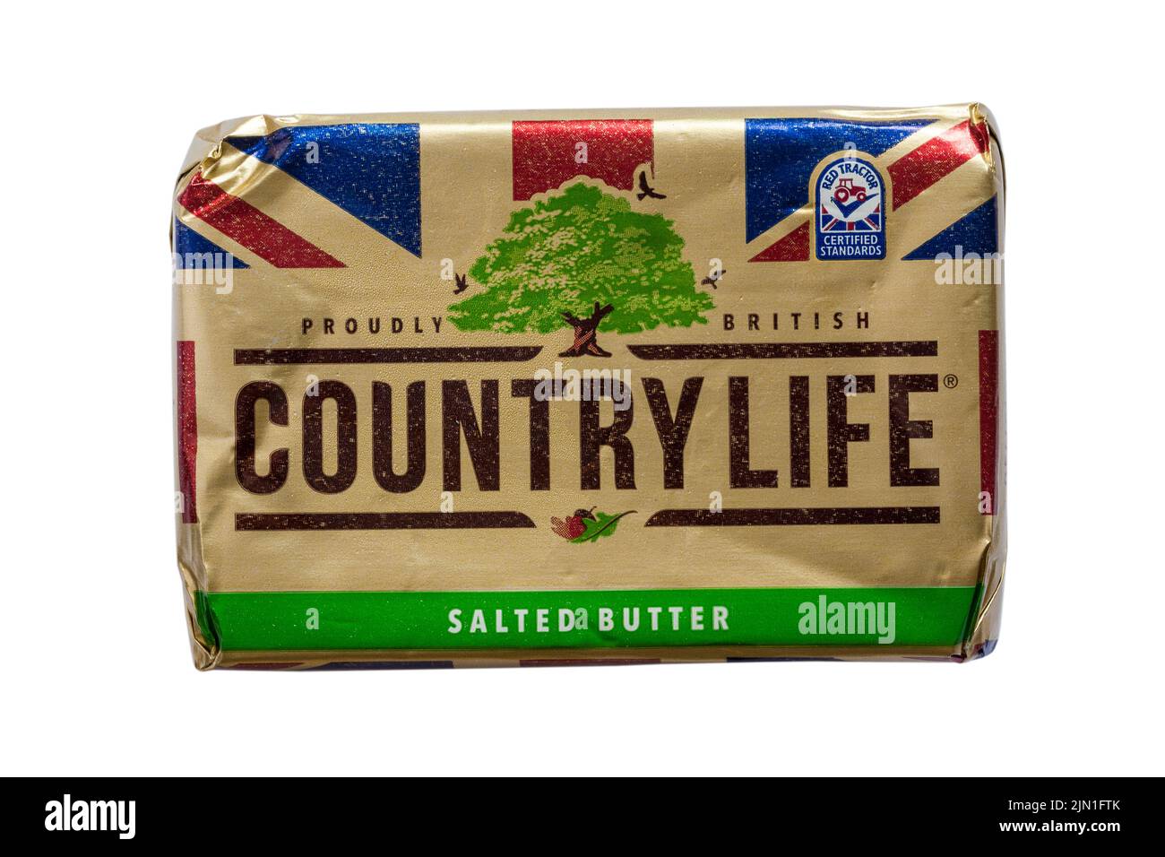 Pack de la mantequilla salada Country Life orgullosamente británica aislada sobre fondo blanco - tractor rojo normas certificadas Foto de stock