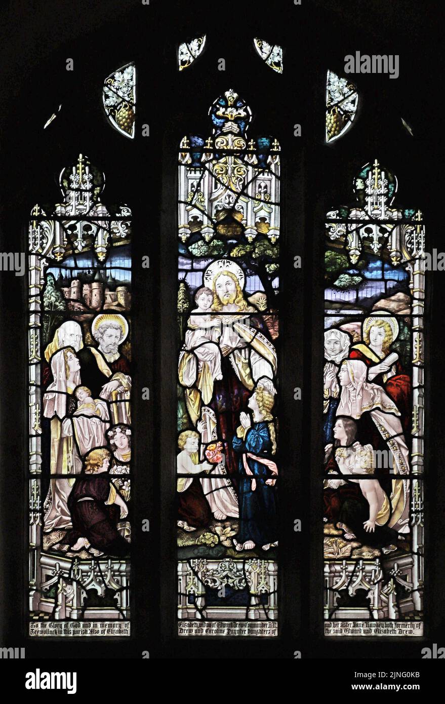 Vitral por Percy Bacon & Hermanos que representan a Cristo Bendición de los niños, Iglesia de St Wenna, St Wenn, Cornwall Foto de stock