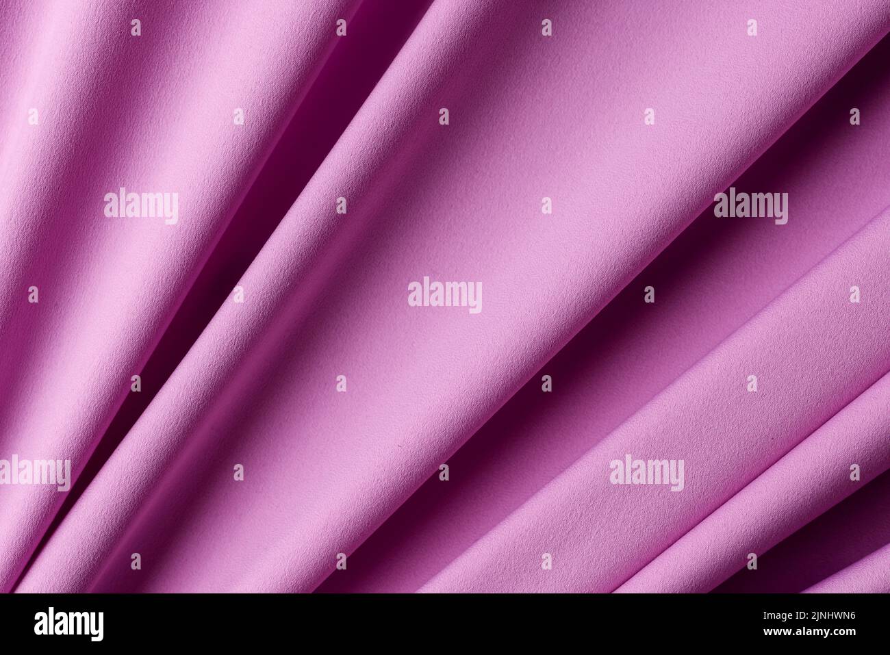 Textura de tela violeta para el fondo y el diseño de obras de arte Foto de stock