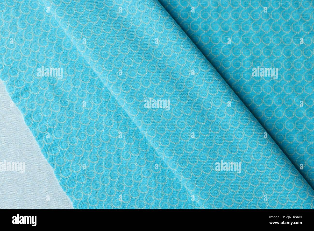 Textura de tela azul claro con impresión para el fondo y el diseño de obras de arte Foto de stock