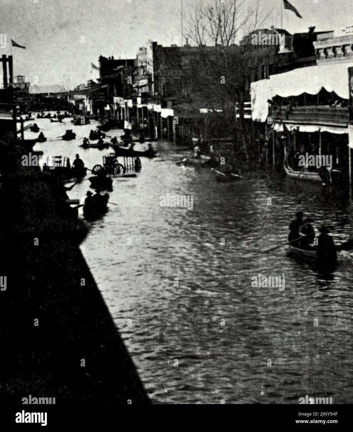 Sacramento City, California, durante la Gran Inundación de 1862 - K Street West de Fourth Street Foto de stock