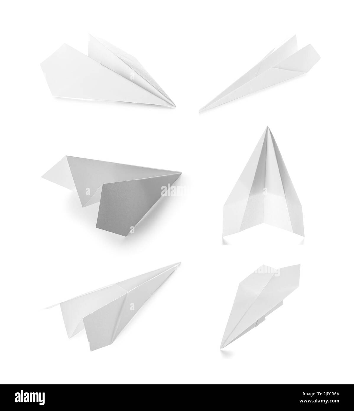 Muchos aviones de papel sobre fondo blanco Fotografía de stock Alamy