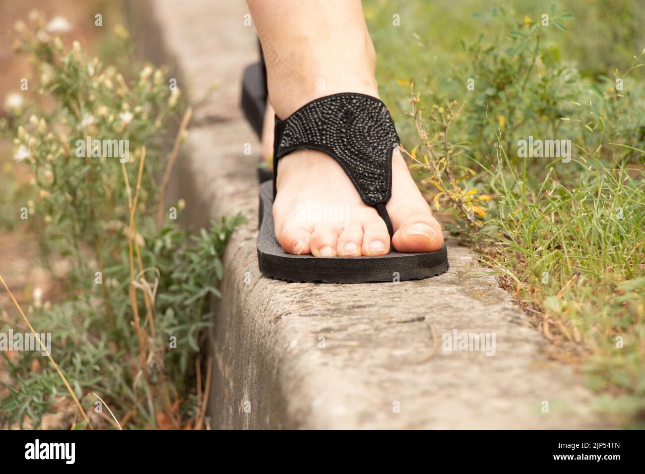 Chanclas de mujer fotografías e imágenes de alta resolución - Alamy