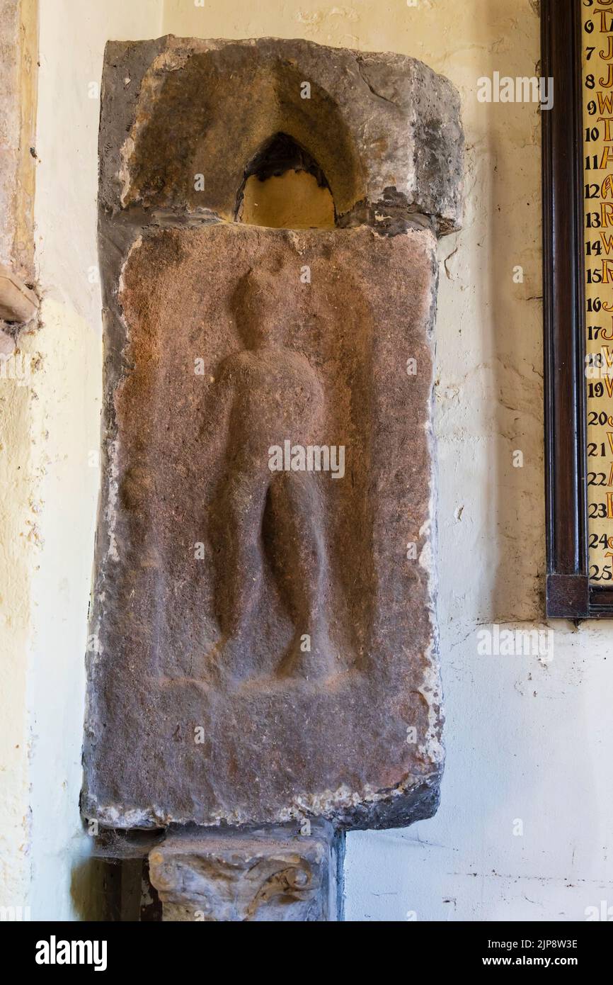 Relieve del dios romano, Mercurio en la iglesia parroquial de San Andrés, Aldborough, Yorkshire, Inglaterra Foto de stock