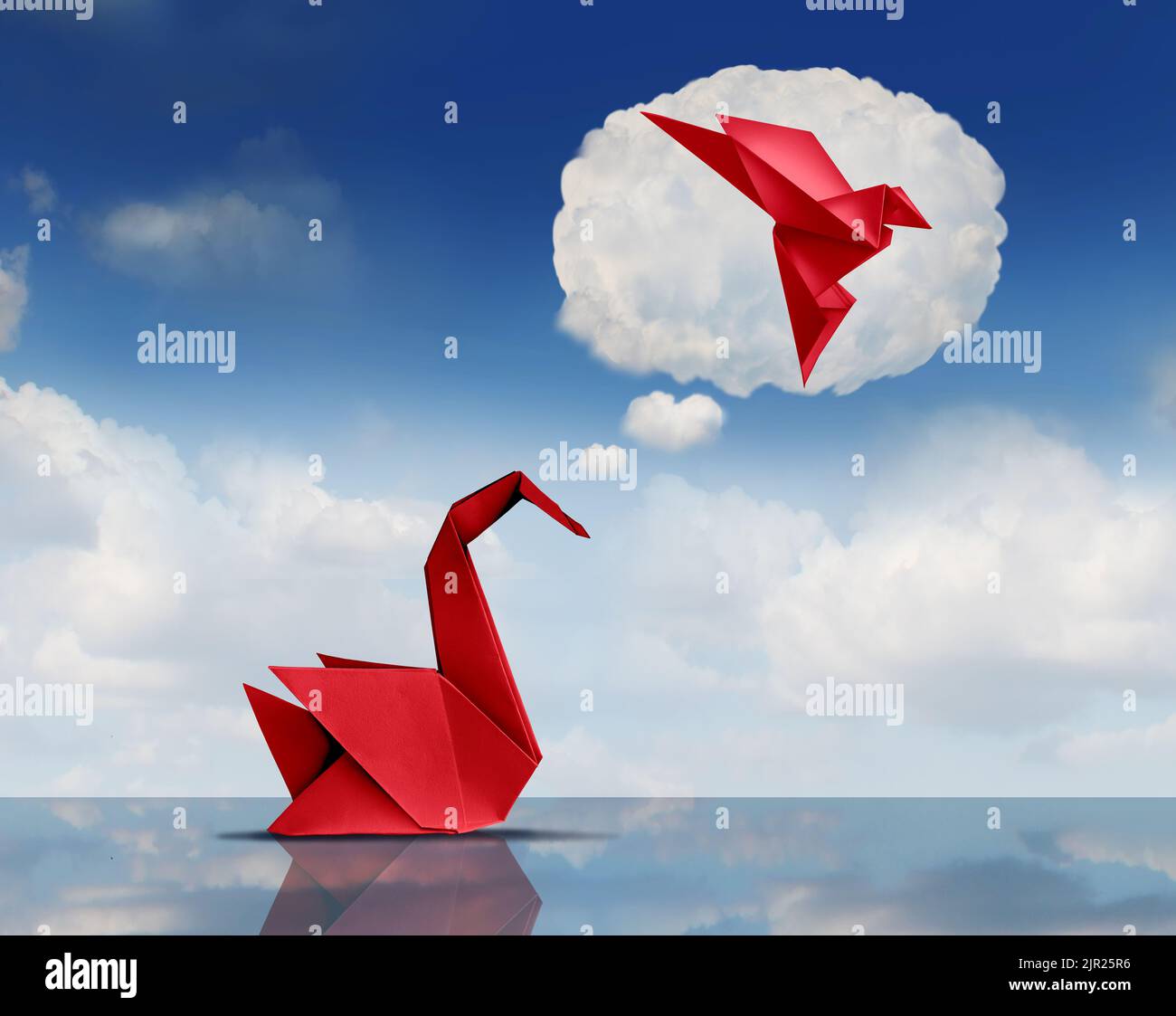 Idea de aspiración y concepto de aspiración o metáfora de ambición como un cisne origami soñando con convertirse en un pájaro volador como logro y esperanza . Foto de stock