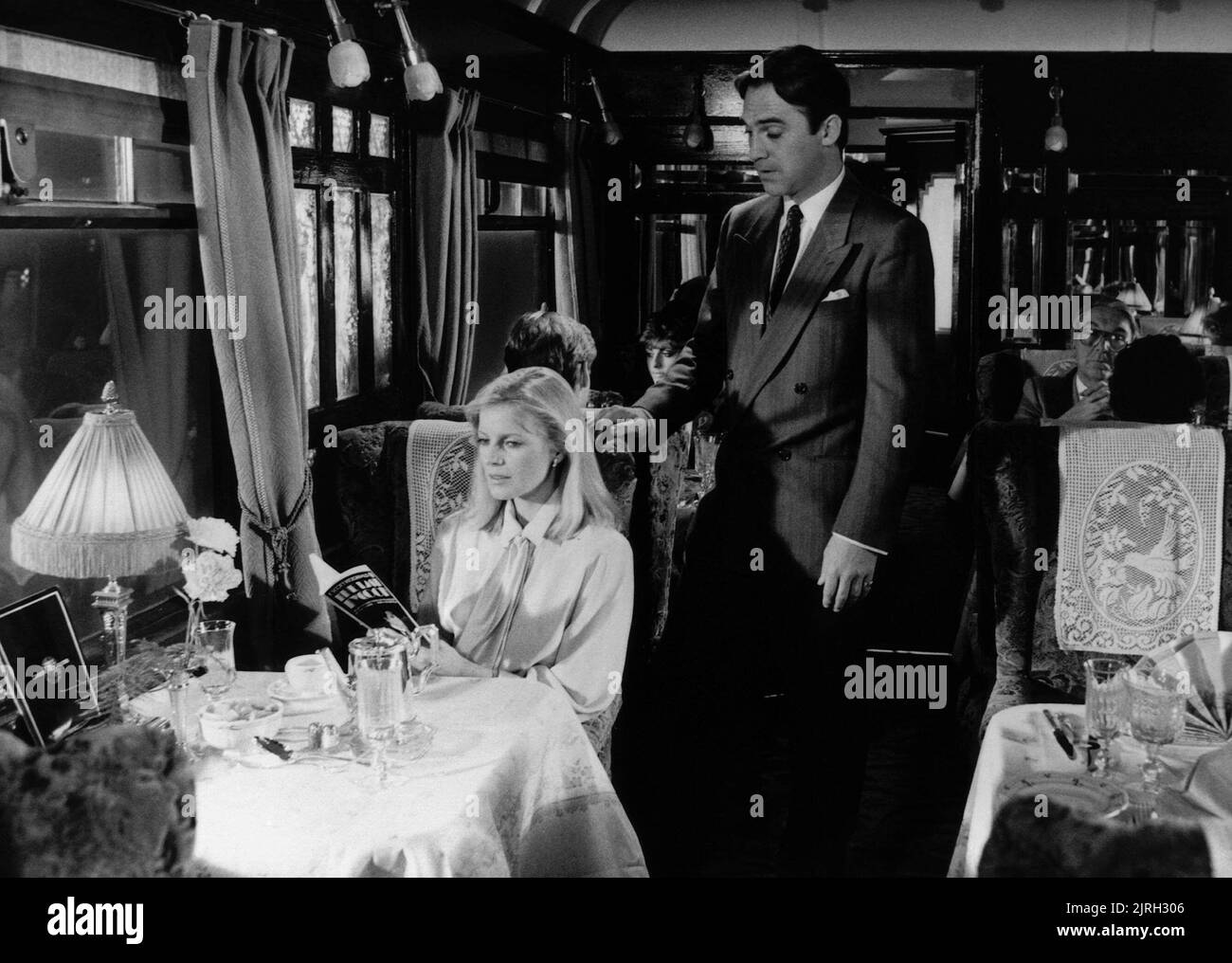 CHERYL Ladd, Stuart Wilson, Romance en el Orient Express, 1985 Foto de stock