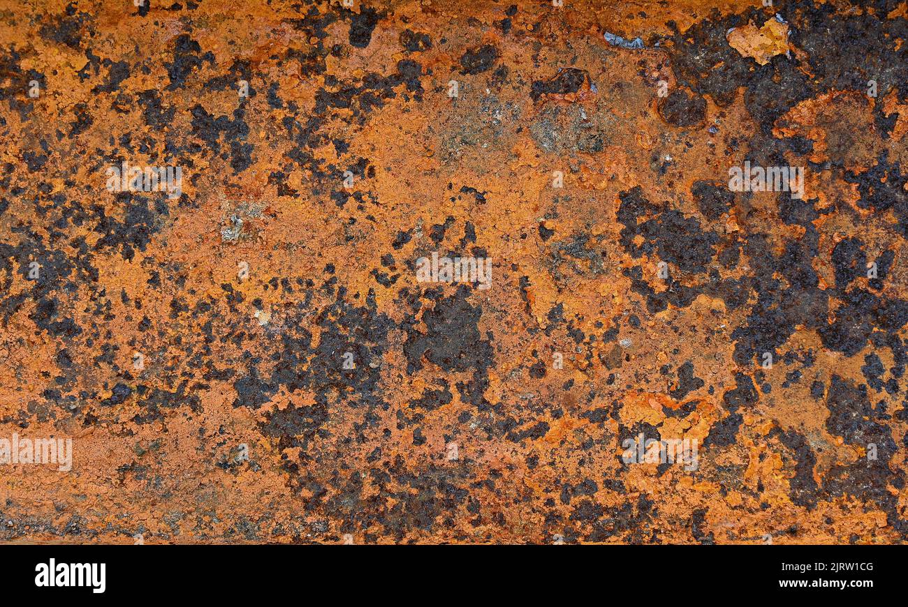 Superficie oxidada, cerca de óxido en la vieja hoja de textura de metal, acero oxidado como textura y fondo Foto de stock