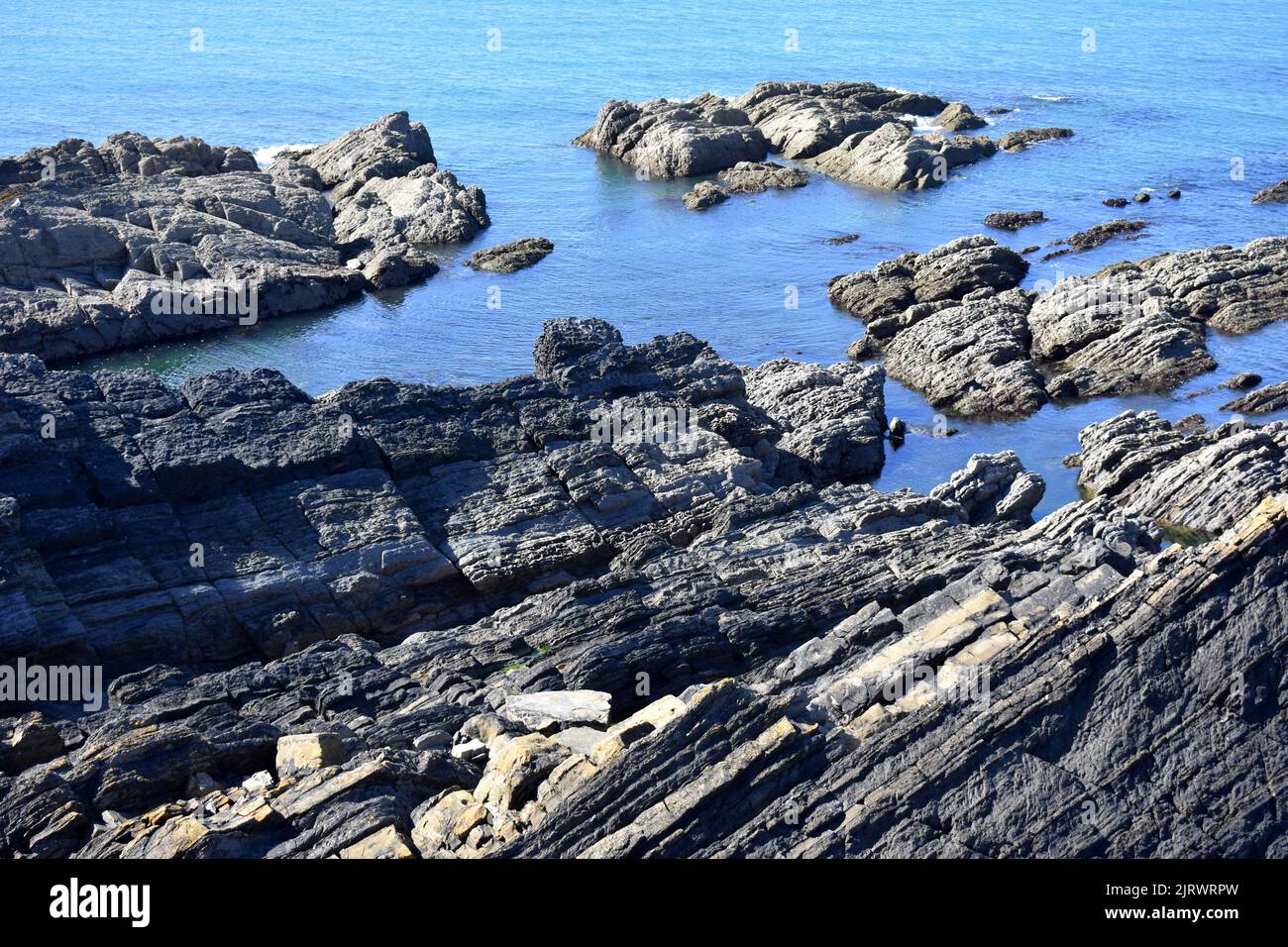 Forseshore rocoso, West Angle, Pembrokeshire, Gales Foto de stock