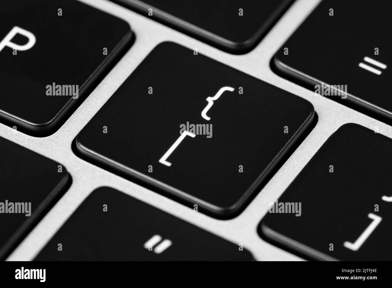 Corchete cuadrado y llave de corchete en el teclado de un portátil  Fotografía de stock - Alamy