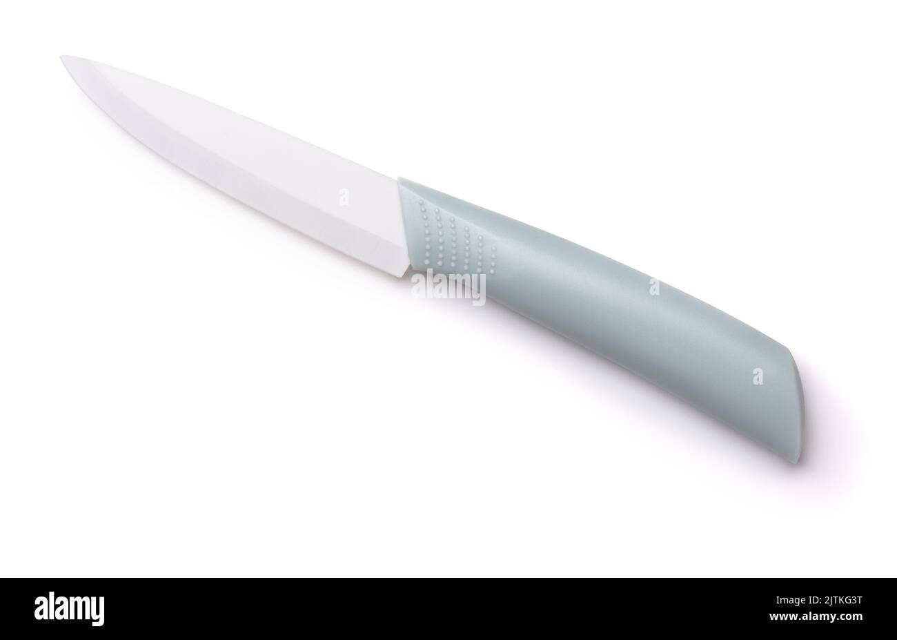Cuchillo de cocina de cerámica de hoja blanca aislado en blanco Foto de stock