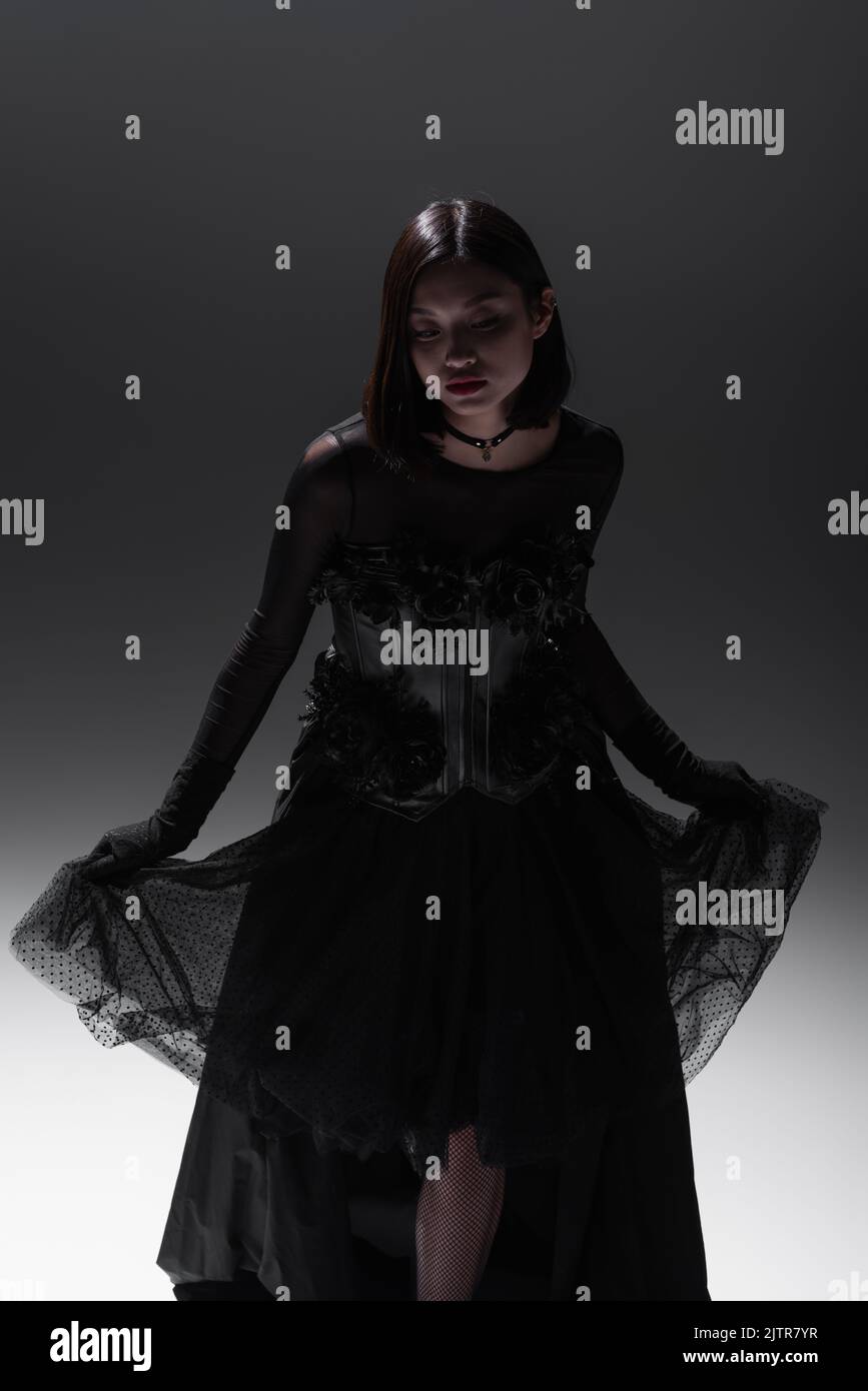 Mujer de apariencia gótica, lencería, actitud dominante Fotografía de stock  - Alamy
