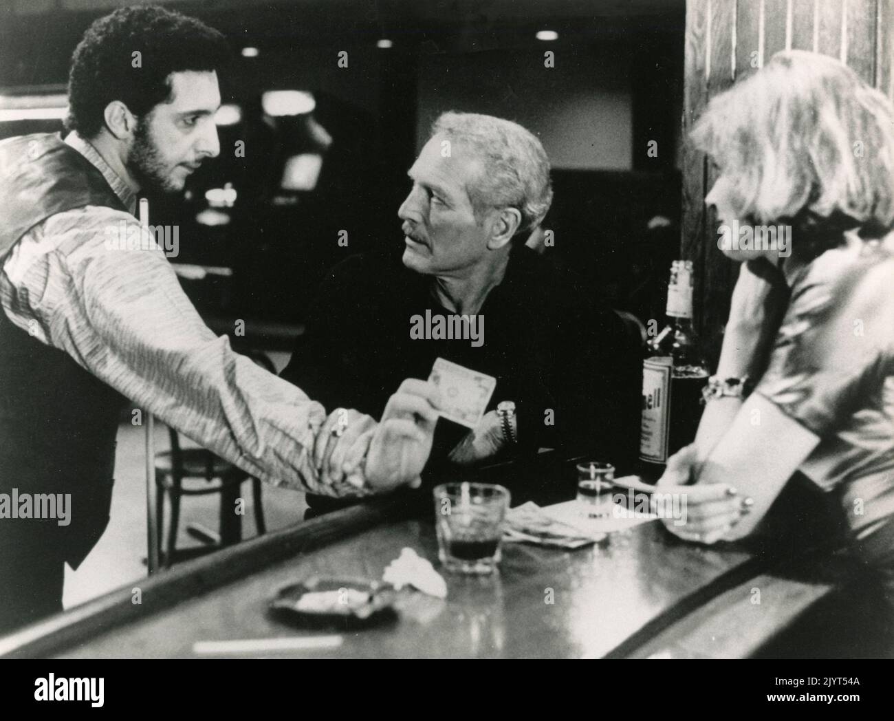 Los actores estadounidenses John Turturro, Paul Newman y la actriz Helen Shaver en la película The Color of Money, USA 1986 Foto de stock