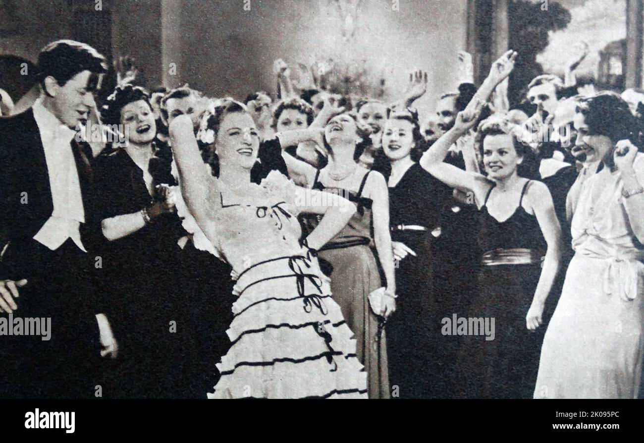Gracie Fields en Shipyard Sally es una película de comedia musical británica de 1939. Dame Gracie Fields DBE OSTJ (nacido Grace Stansfield; 9 de enero de 1898 - 27 de septiembre de 1979) fue una actriz, cantante, comediante y estrella del cine y de la sala de música inglesa, que fue una de las diez mejores estrellas de cine en Gran Bretaña durante los años 1930s y la estrella de cine más pagada del mundo en 1937. Foto de stock