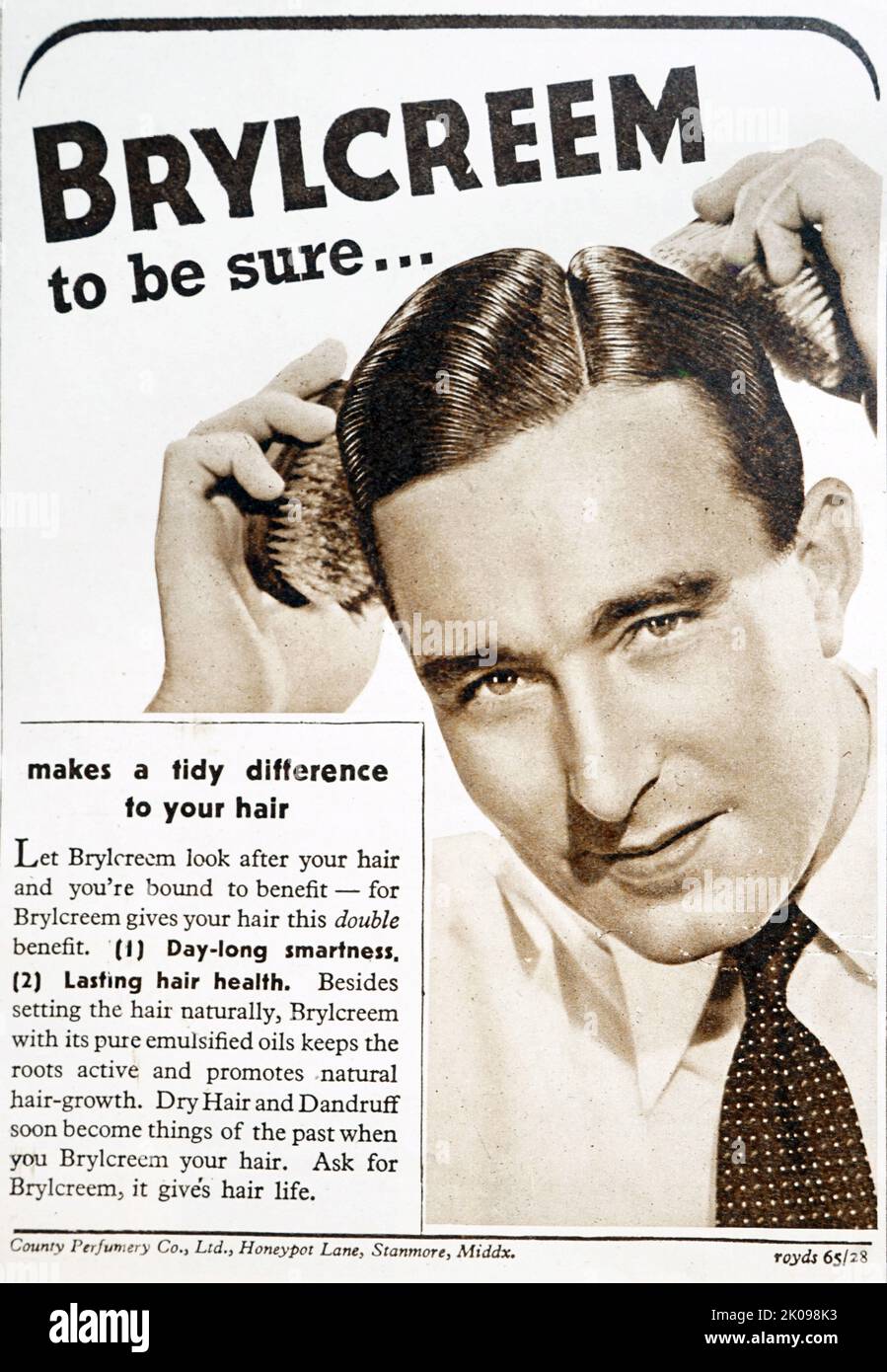 Anuncio en el periódico de Brylcreem, crema para el pelo de los hombres. Foto de stock