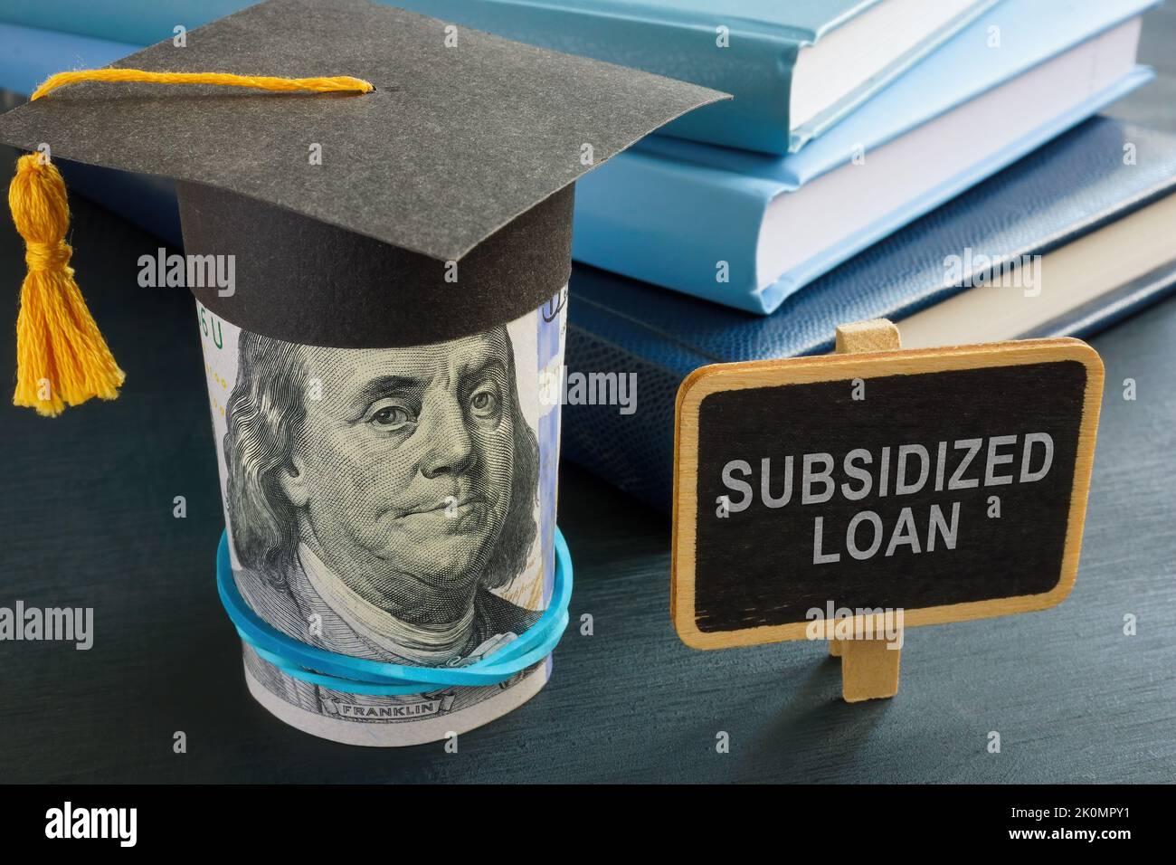 Signo de préstamo subsidiado y límite de graduación estudiantil. Foto de stock