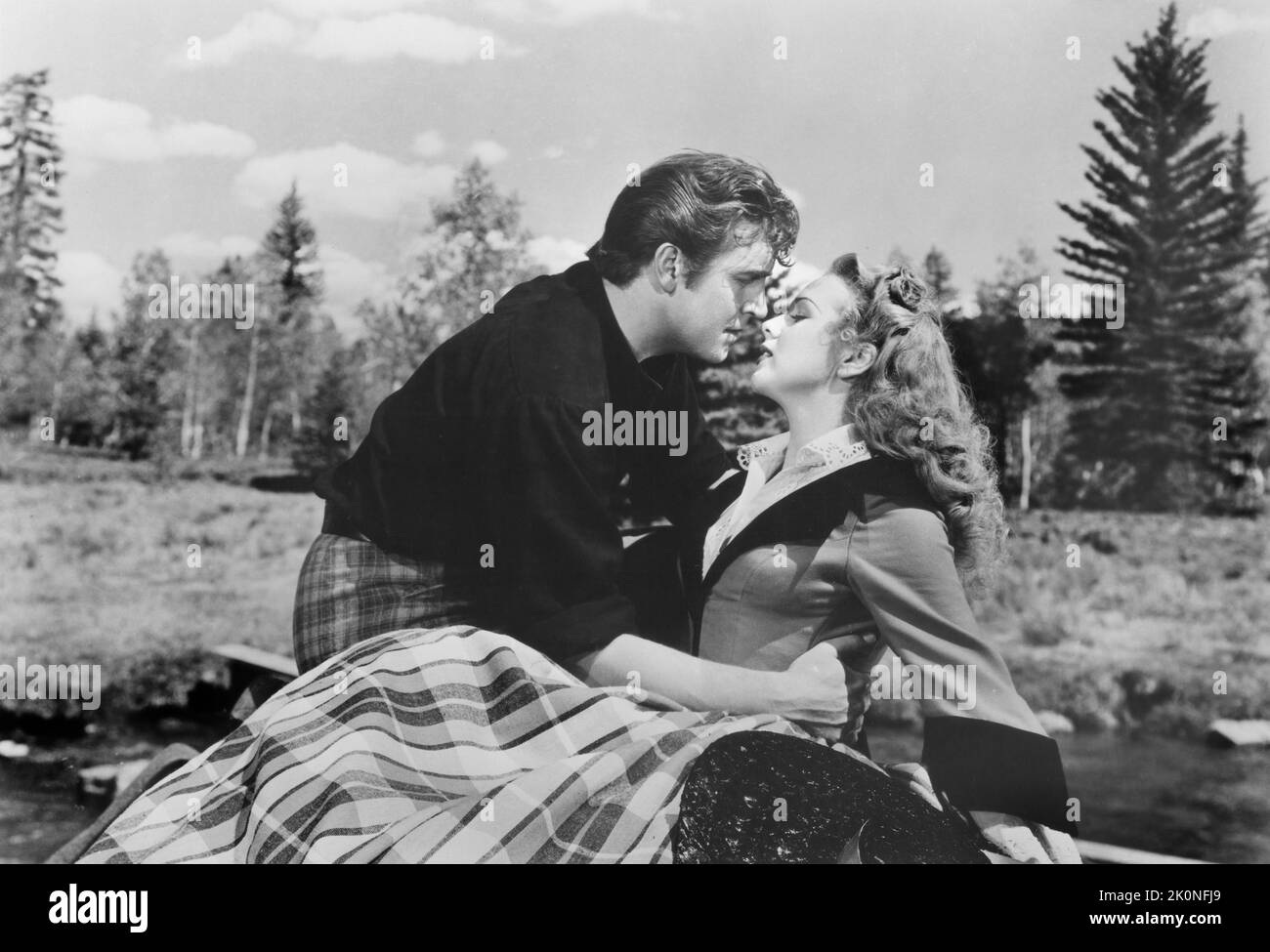 Robert Paige, Deanna Durbin, en el rodaje de la película, 'Can't Help Singing', Universal Pictures, 1944 Foto de stock