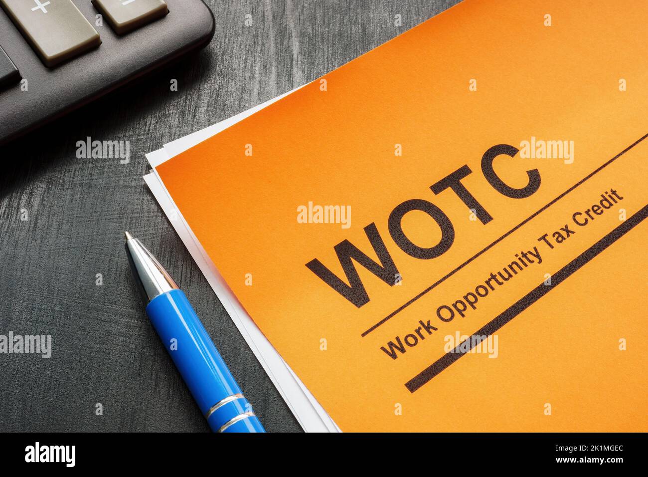 Oportunidad de trabajo crédito fiscal WOTC aplicación, pluma y bloc de notas. Foto de stock