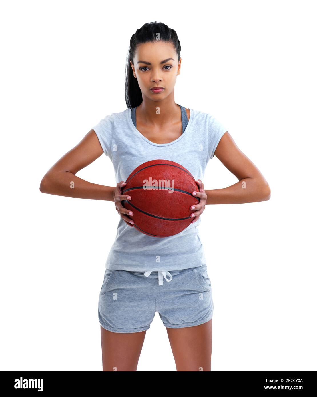 Bola de la wanna. Retrato recortado de una mujer de baloncesto aislada sobre blanco. Foto de stock