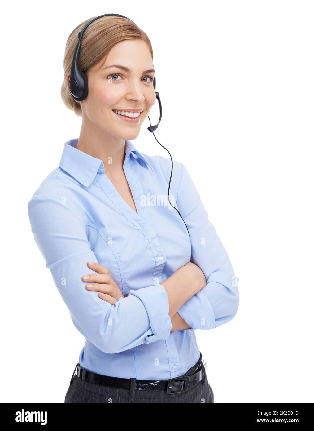 Usted puede oír su sonrisa por teléfono. Retrato de un joven y atractivo secretario que lleva un auricular. Foto de stock