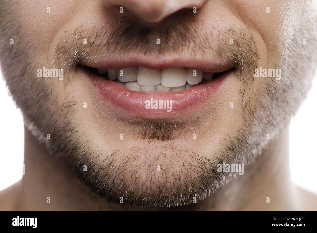 Cerca de la boca masculina con asmile Foto de stock