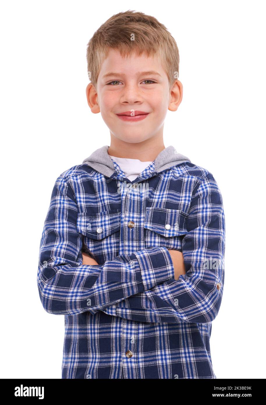 Va a crecer. Estudio de un niño vestido casualmente aislado sobre blanco. Foto de stock