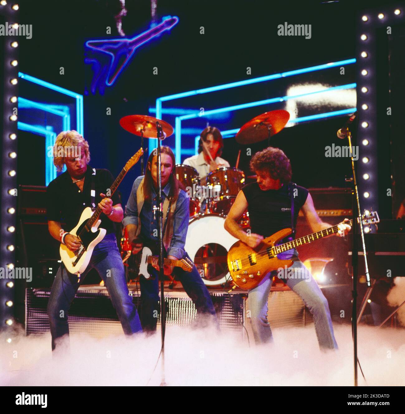Status quo, Britische Rock Band, TV Auftritt, Alemania, 1983. Status quo, British Rock group, TV performance, Alemania, 1983. Foto de stock