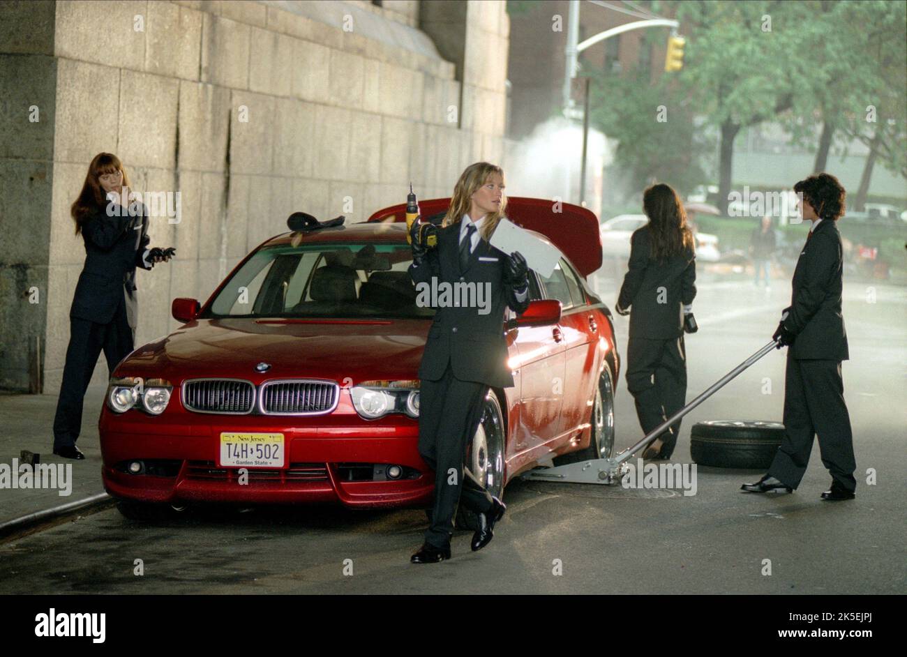 ANA CRISTINA DE OLIVEIRA, Gisele Bündchen, Magali Amadei, INGRID VANDEB.S., taxi, 2004 Foto de stock