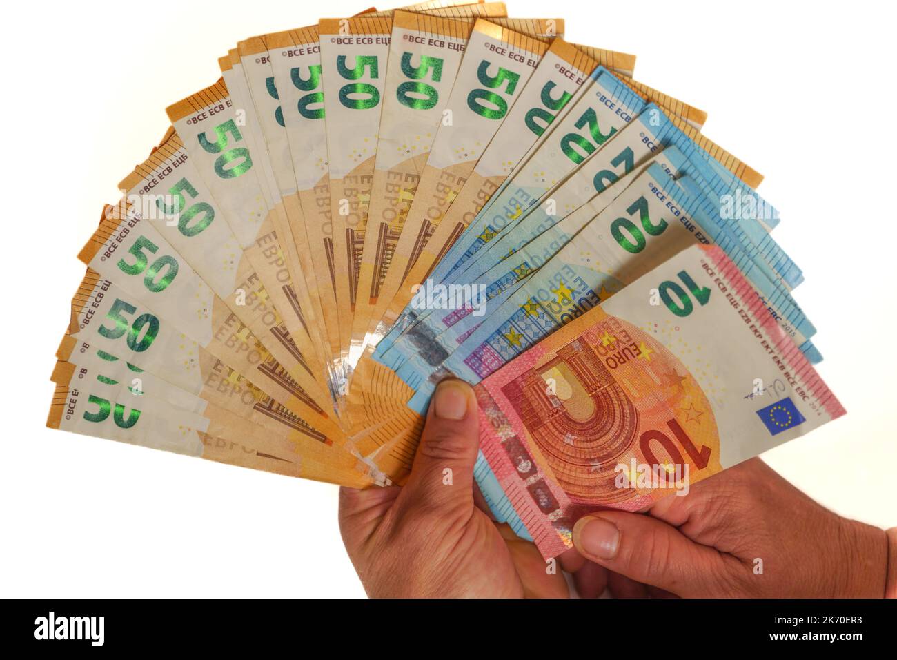 manos de mujer con billetes en euros en forma de abanico Foto de stock