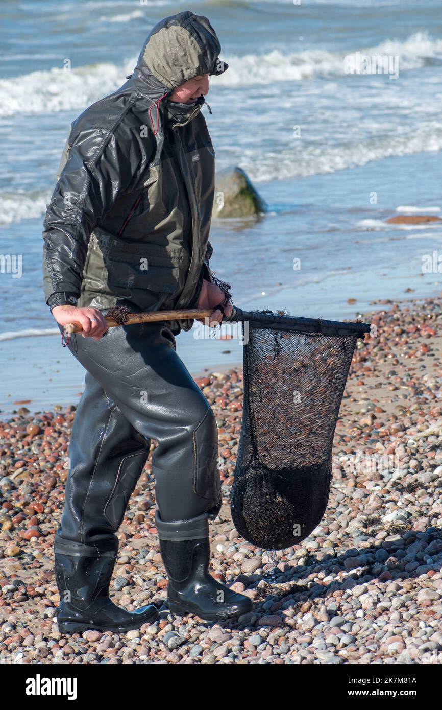 Fisherman boots fotografías e imágenes de alta resolución - Alamy