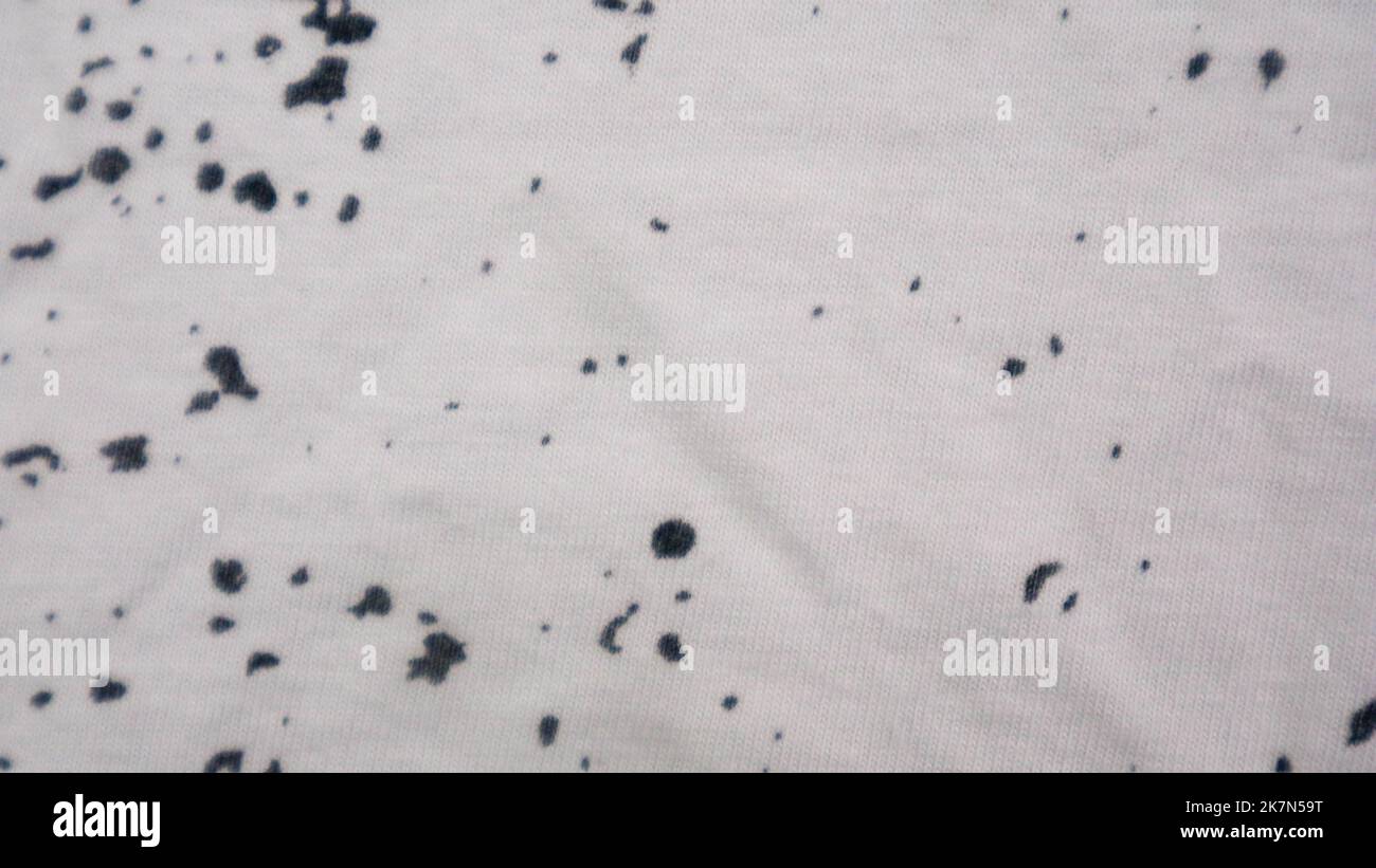 Textura de tela blanca con manchas negras como fondo Fotografía de stock -  Alamy