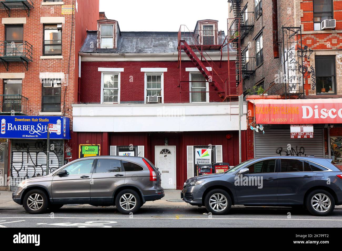 47 Madison St, Nueva York, Nueva York, Nueva York, foto del escaparate de un edificio en Manhattan Chinatown. Foto de stock