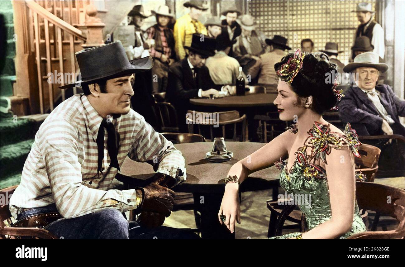 Rod Cameron & Yvonne De Carlo Película: La novia no estaba dispuesta (1942) Personajes: Johnny Hart, Lorena Dumont Directora: Charles Lamont 14 de diciembre de 1945 **ADVERTENCIA** Esta fotografía es sólo para uso editorial y es copyright DE UNIVERSAL y/o del Fotógrafo asignado por la Film o Production Company y sólo puede ser reproducida por publicaciones en conjunción con la promoción de la película anterior. Se requiere un crédito obligatorio para UNIVERSAL. El fotógrafo también debe ser acreditado cuando se conoce. No se puede conceder ningún uso comercial sin la autorización escrita de la Film Company. Foto de stock