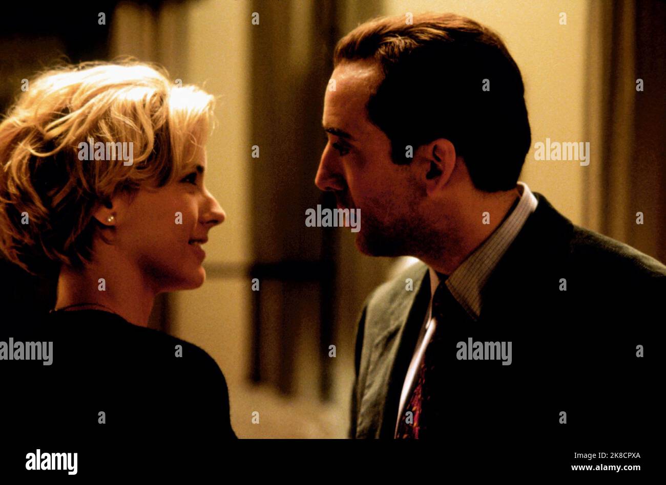 TEA Leoni & Nicolas Cage Película The Family Man (2000) Personajes