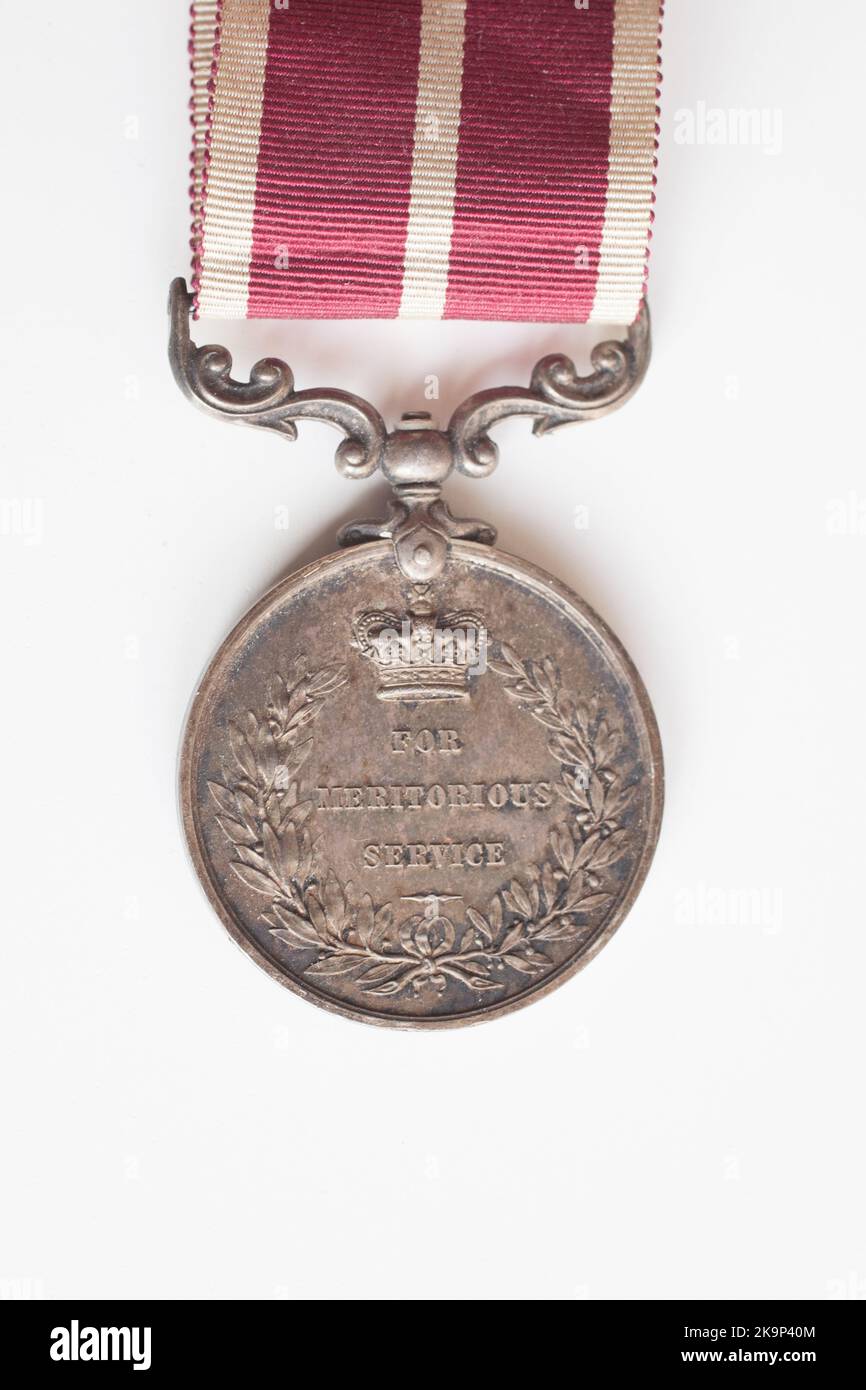 La Medalla por Servicio Meritorio, una medalla británica otorgada a los Sargentos y Oficiales de Orden de las Fuerzas Armadas Británicas por el servicio meritorio de 1916 a 1 Foto de stock