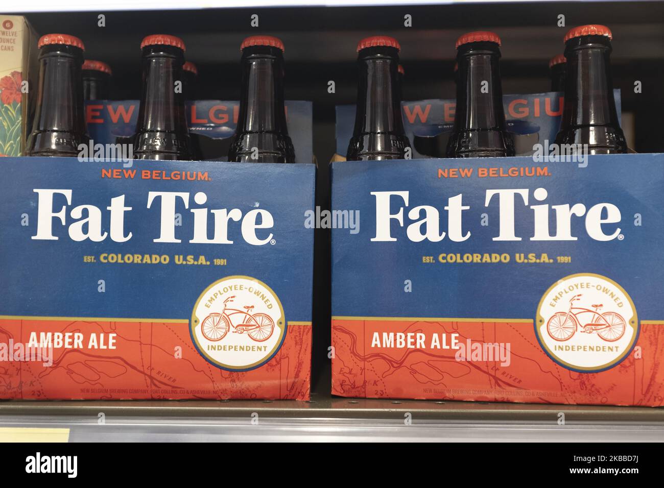 New belgium brewing companys cerveza fat tire amber ale fotografías e