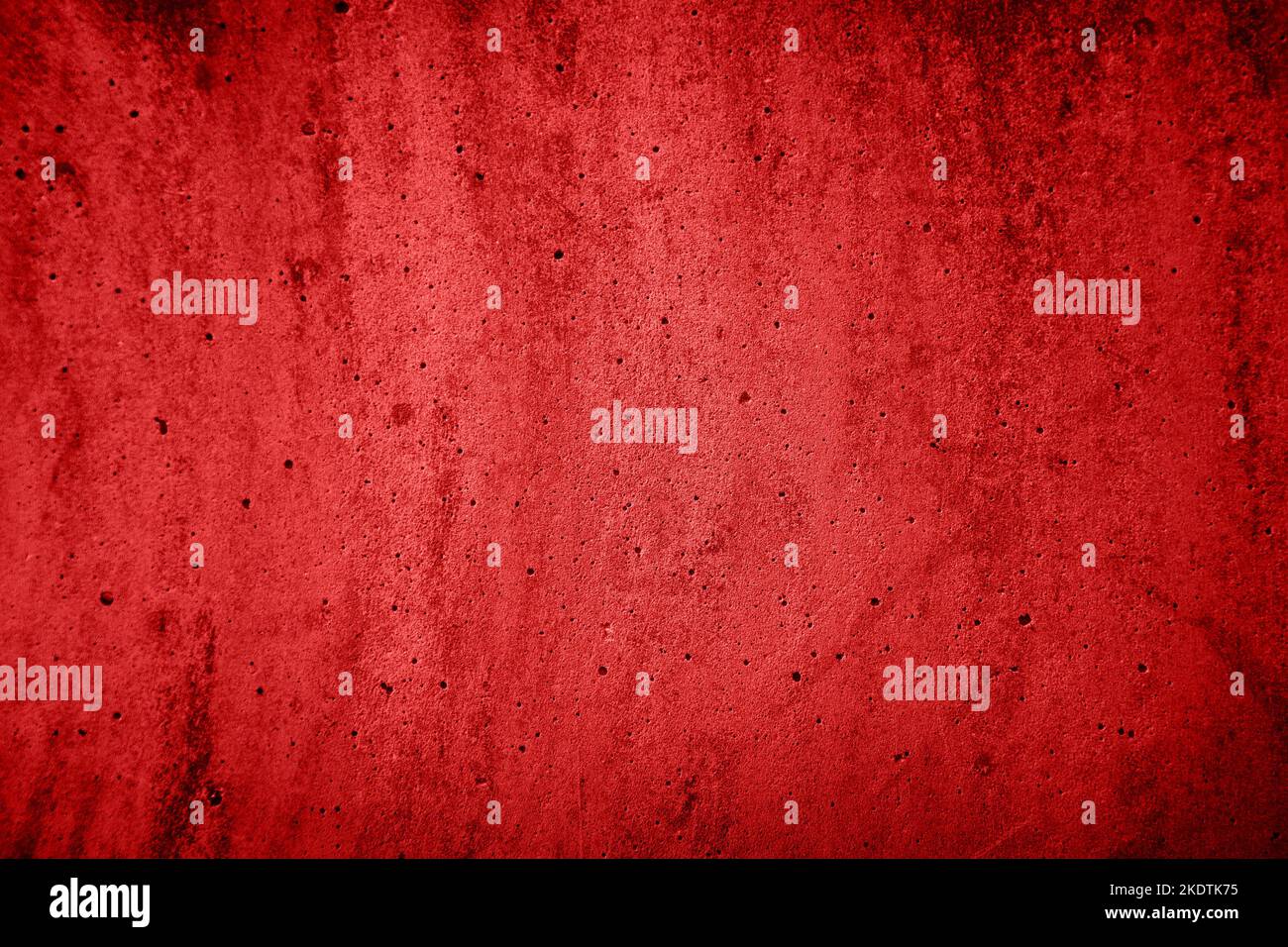 Muro de hormigón con textura de fondo rojo Foto de stock