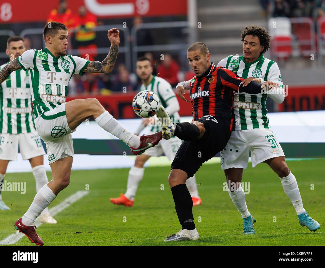 BUDAPEST, HUNGARY - JUNE 20: (r-l) Isael da Silva Barbosa of Ferencvarosi TC  challenges Dzenan Burekovic of Ujpest FC during the Hungarian OTP Bank Liga  match between Ferencvarosi TC and Ujpest FC