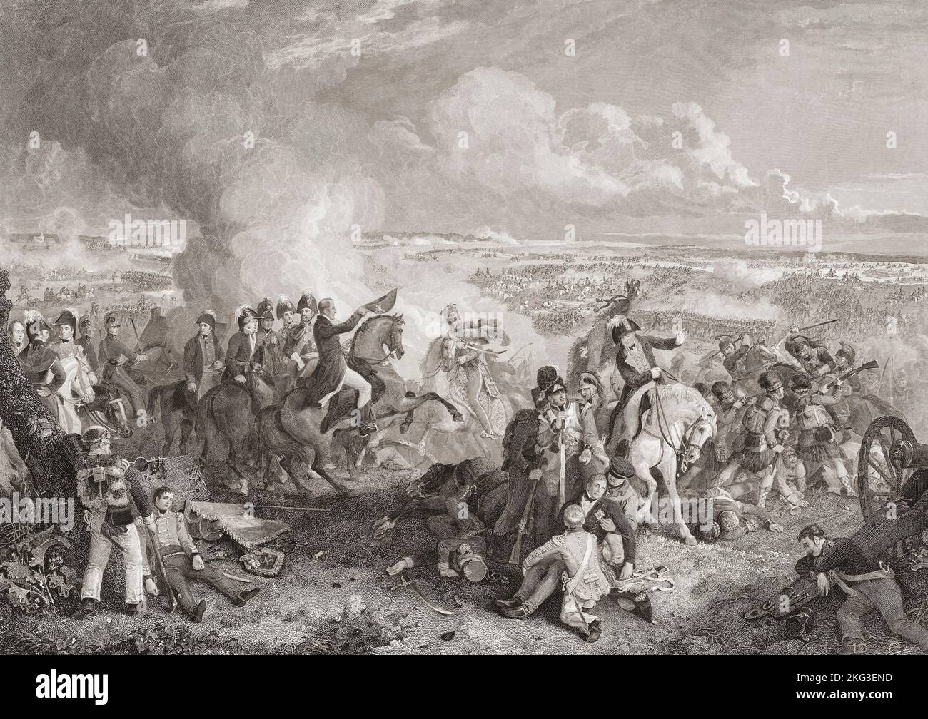La Batalla de Waterloo, 18 de junio de 1815. El duque de Wellington a caballo con sombrero en la mano, en el centro, ha recibido noticias de que el Mariscal de Campo von Blucher y sus tropas prusianas están en camino a la batalla. Después de una impresión del siglo 19th por John Burnet. Foto de stock